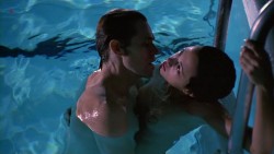 Asia Argento nude topless and sex in the pool - New Rose Hotel (1998)