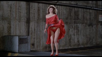 Kelly LeBrock nude brief topless and bush - The Woman in Red (1984) HD 1080p BluRay
