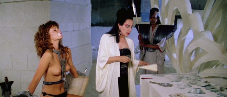 Tawny Kitaen nude topless scenes in Gwendoline (FR-1984)
