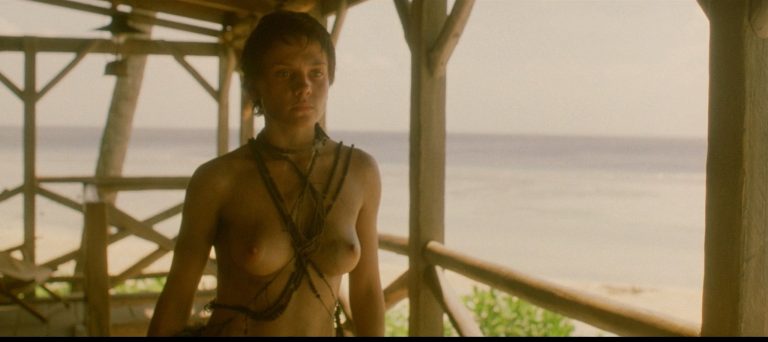 Maya Stange nude topless and sex – In A Savage Land (AU-1999) 1080p Web