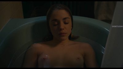 Alice Isaaz nude topless in tub cute and sexy - The Lodger (2020) 1080p Web