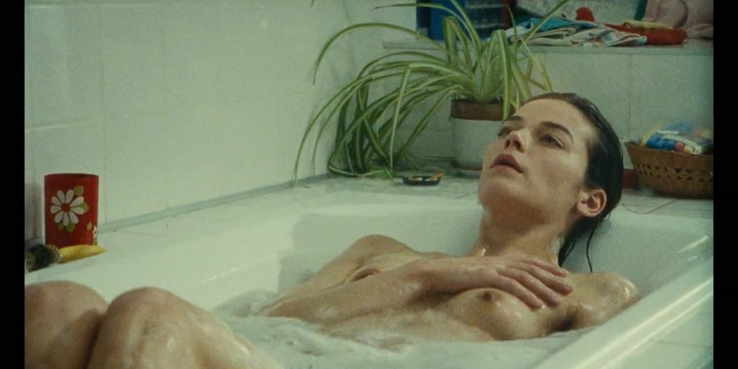 Marianne Denicourt nude topless in the tub La vie des morts FR 1991 720p WEB 2