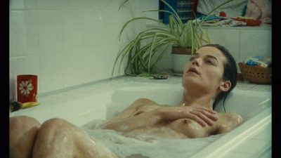Marianne Denicourt nude topless in the tub - La vie des morts (FR-1991) 720p WEB