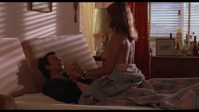 Zoe Carides nude side boob scenes in Death in Brunswick (AU-1990) 1080p Web